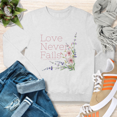 Love Never Fails Floral Christian Sweatshirt
