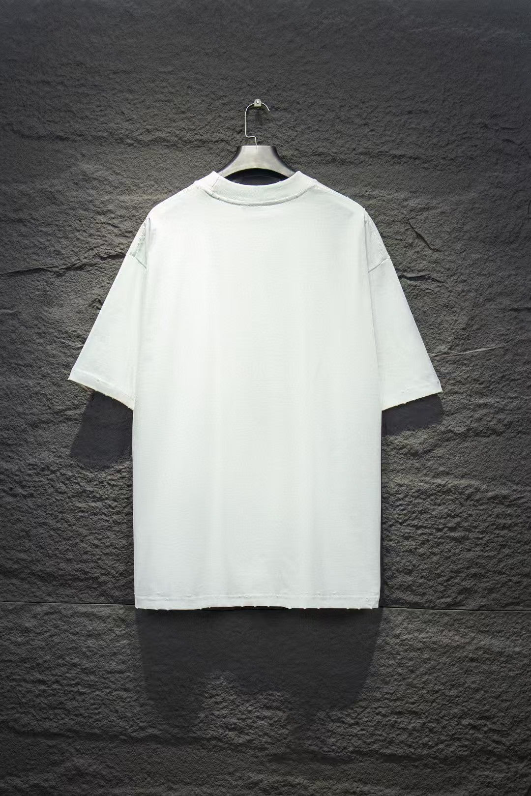 Washed and worn short sleeved T-shirt