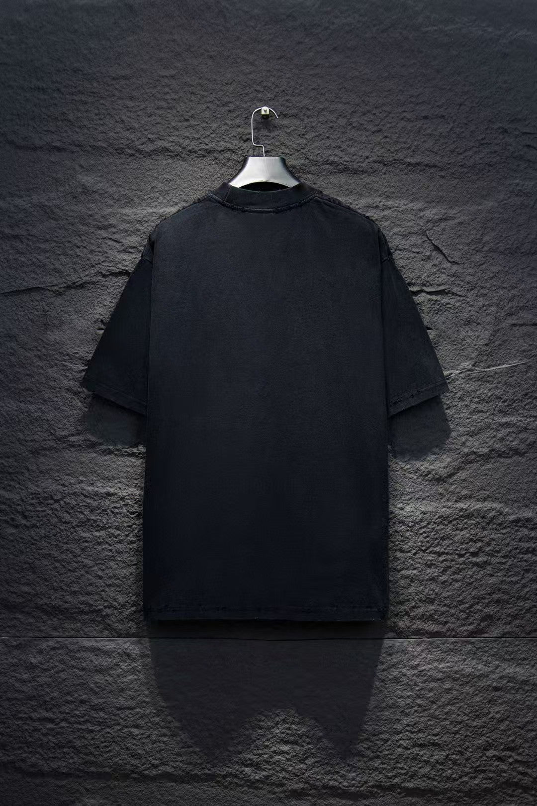 Washed and worn short sleeved T-shirt