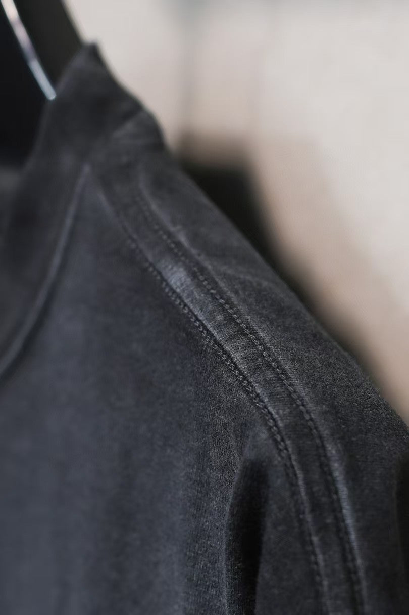 Short sleeved T-shirt with embossed paper tape
