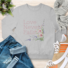 Love Never Fails Floral Christian Sweatshirt
