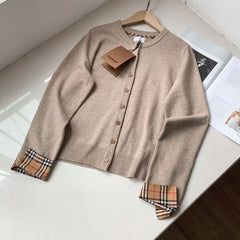 Embroidered long sleeved checkered knit sweater