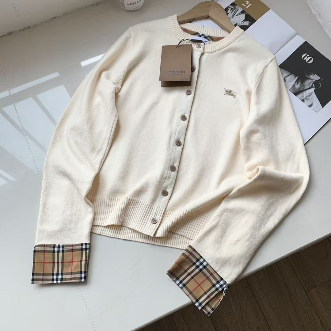 Embroidered long sleeved checkered knit sweater