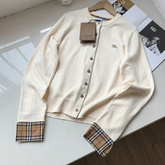 Embroidered long sleeved checkered knit sweater
