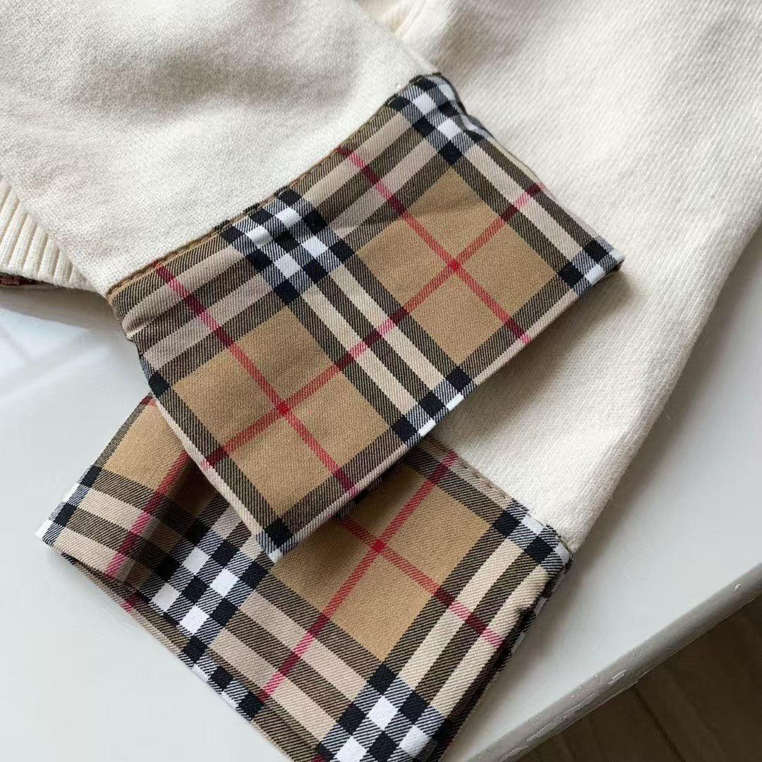 Embroidered long sleeved checkered knit sweater