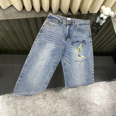 Embroidered front and back washed denim jeans