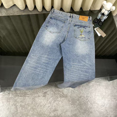 Embroidered front and back washed denim jeans