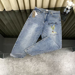 Embroidered front and back washed denim jeans