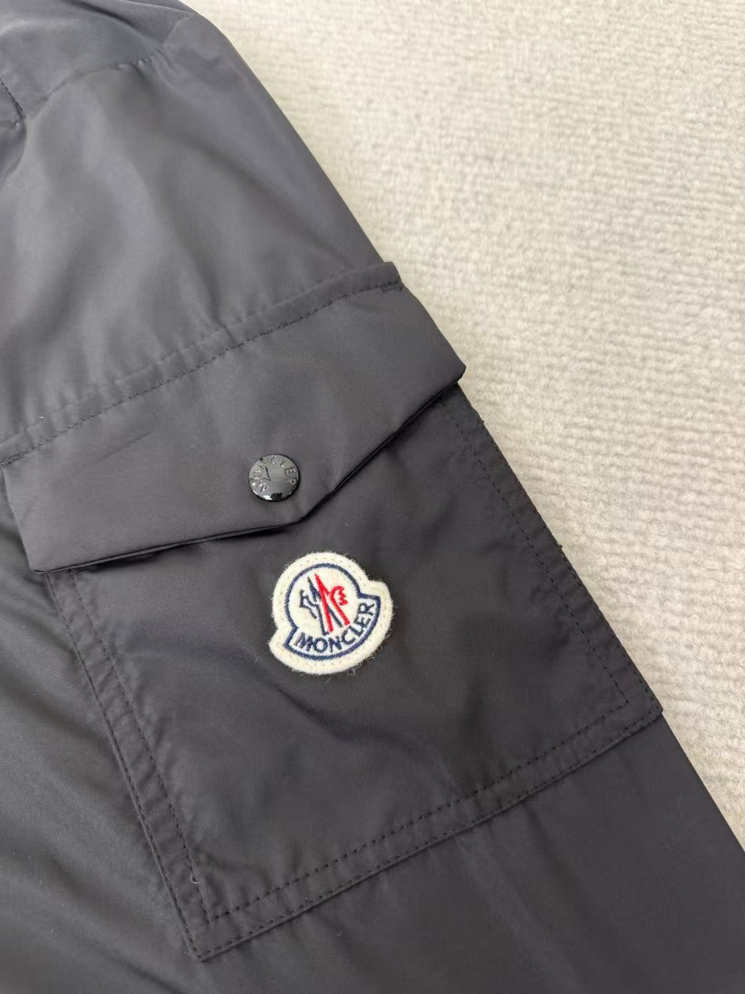 Embroidered hooded windbreaker jacket