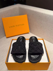 Black slippers and shoes