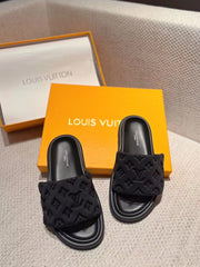 Black slippers and shoes