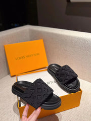 Black slippers and shoes