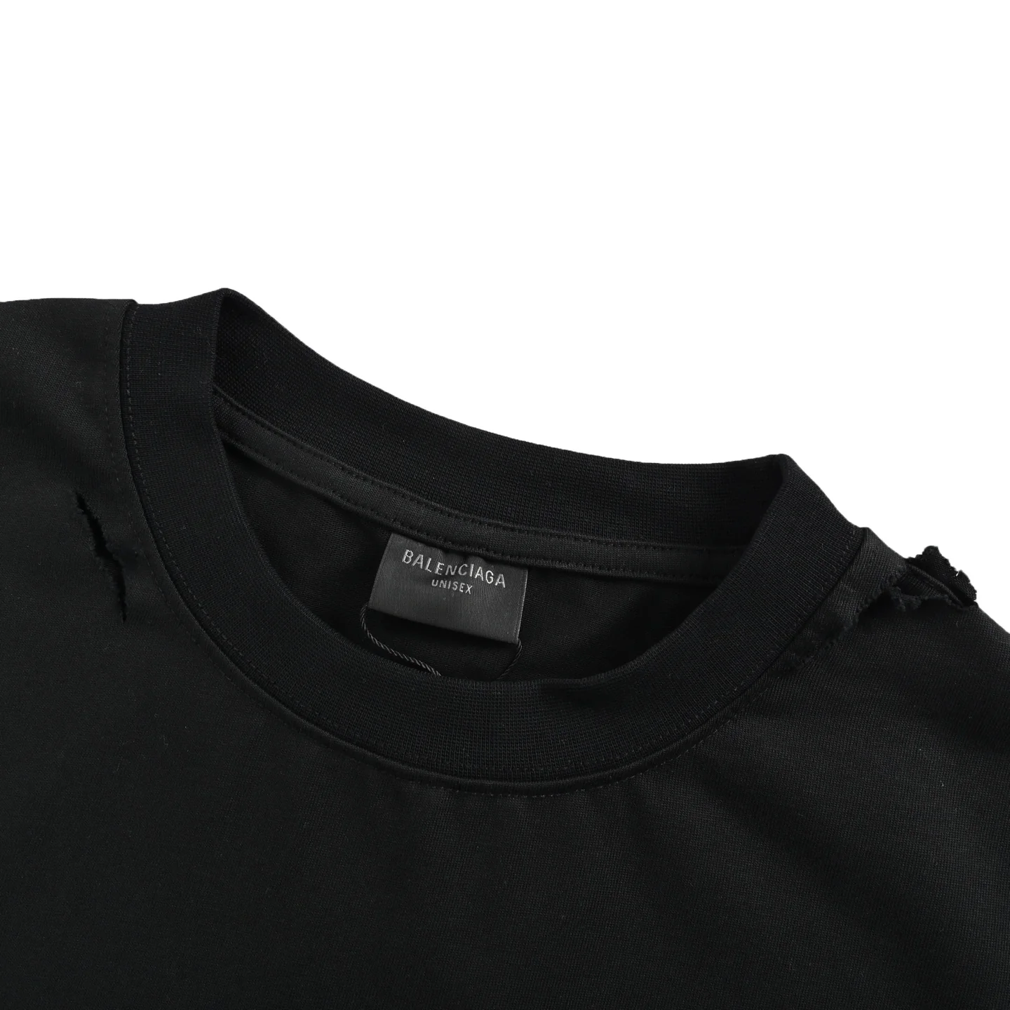 Eye chart knife cuts holes in short sleeves