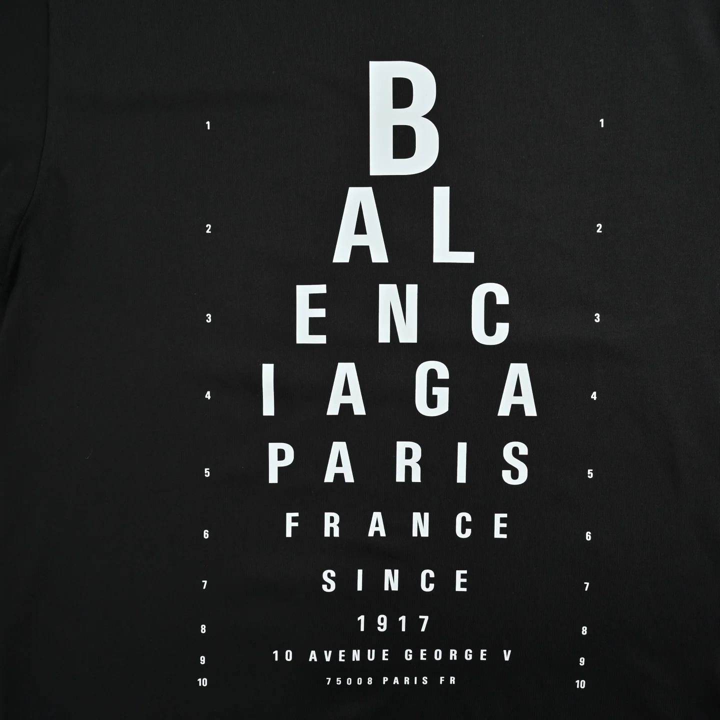 Eye chart knife cuts holes in short sleeves
