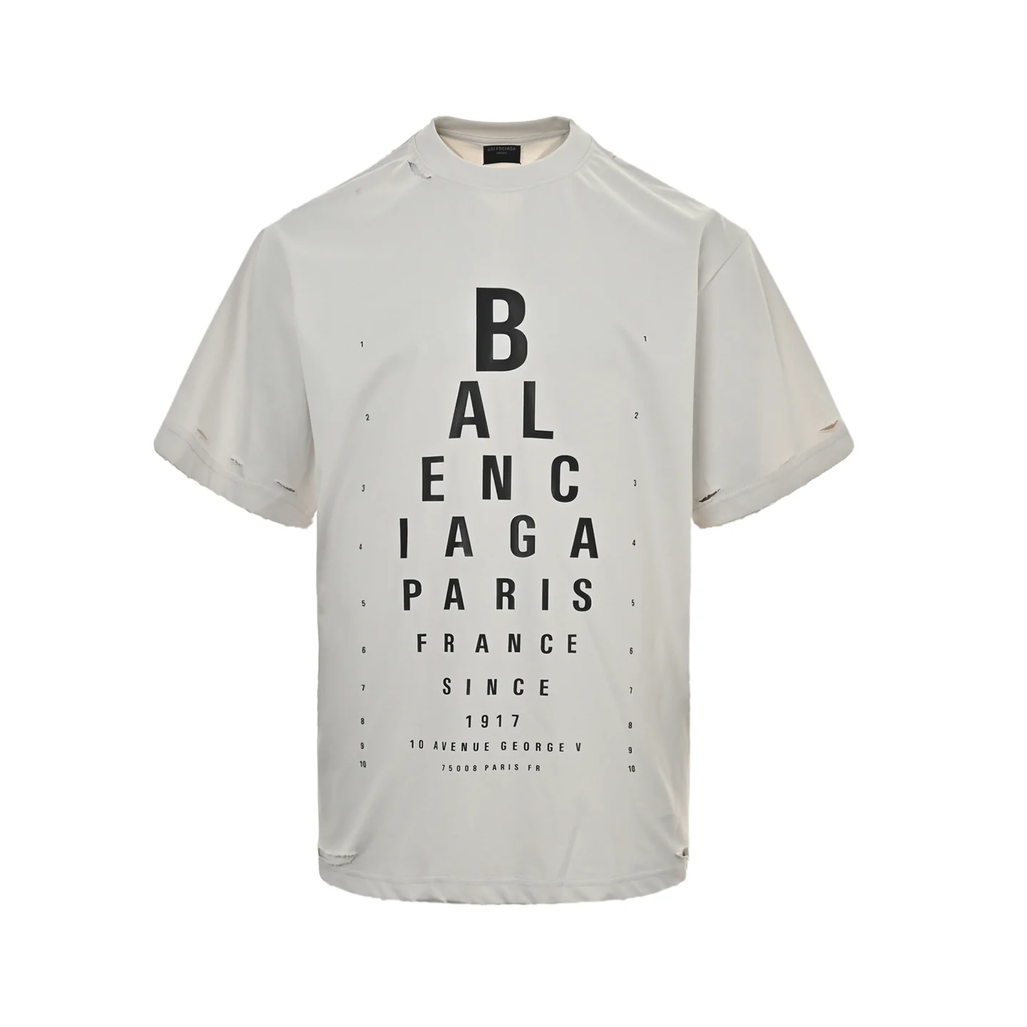 Eye chart knife cuts holes in short sleeves