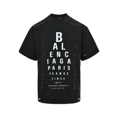 Eye chart knife cuts holes in short sleeves