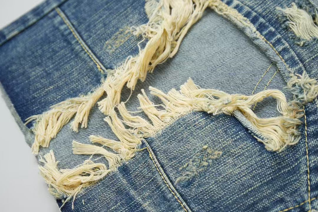 Wear and tear hole loose fit denim shorts