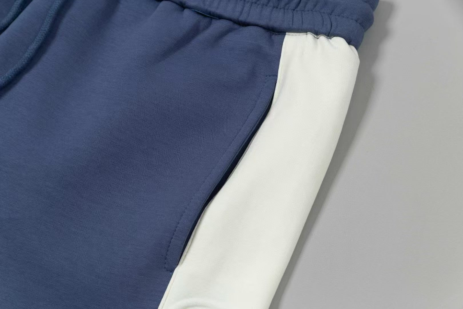 Men's spliced three-dimensional shorts