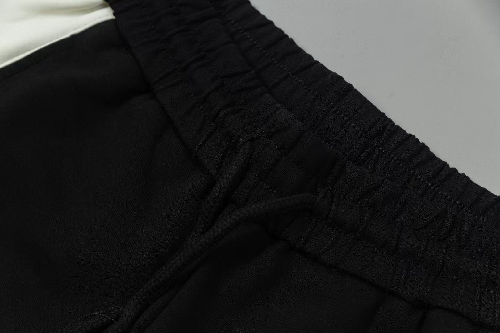 Men's spliced three-dimensional shorts