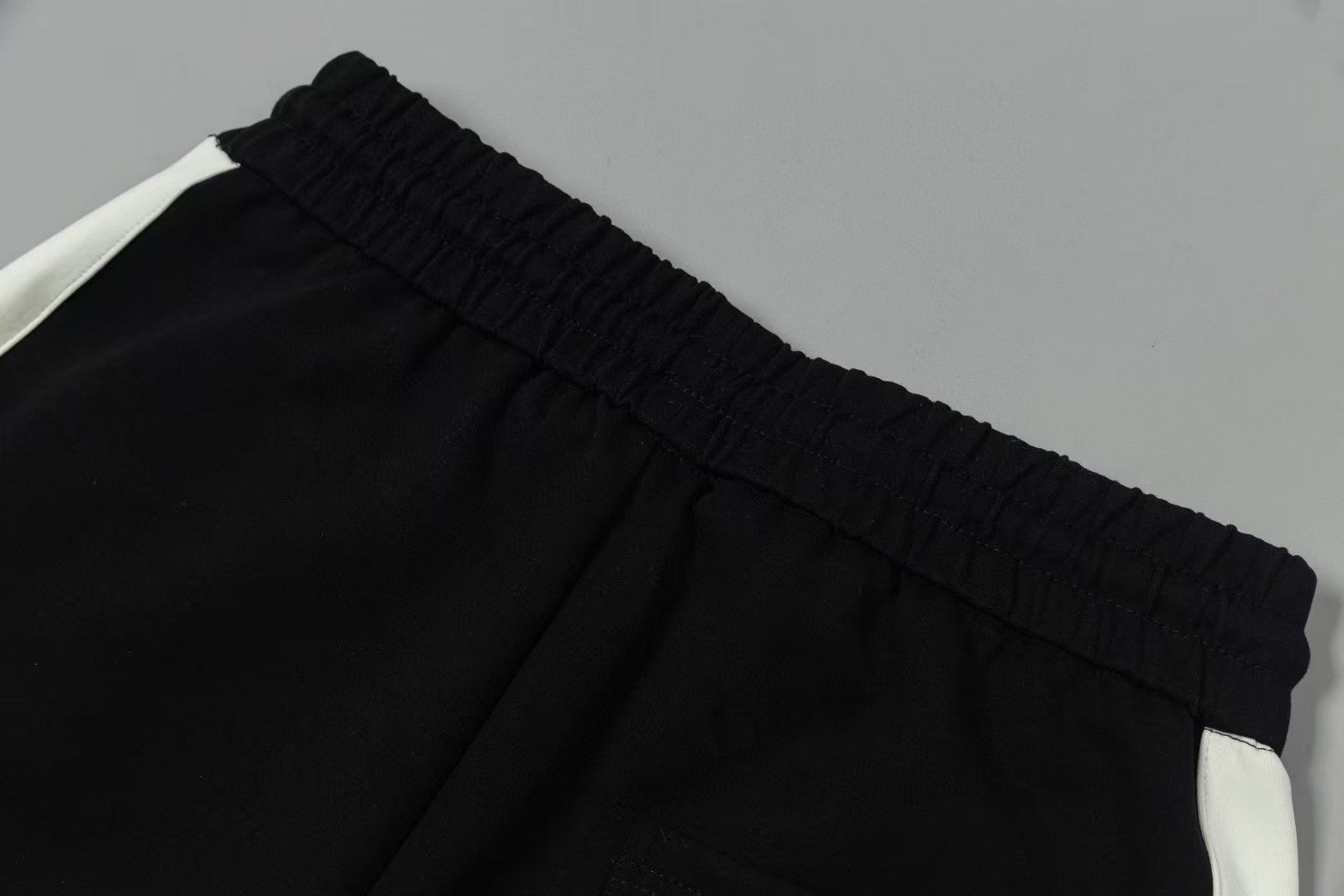 Men's spliced three-dimensional shorts