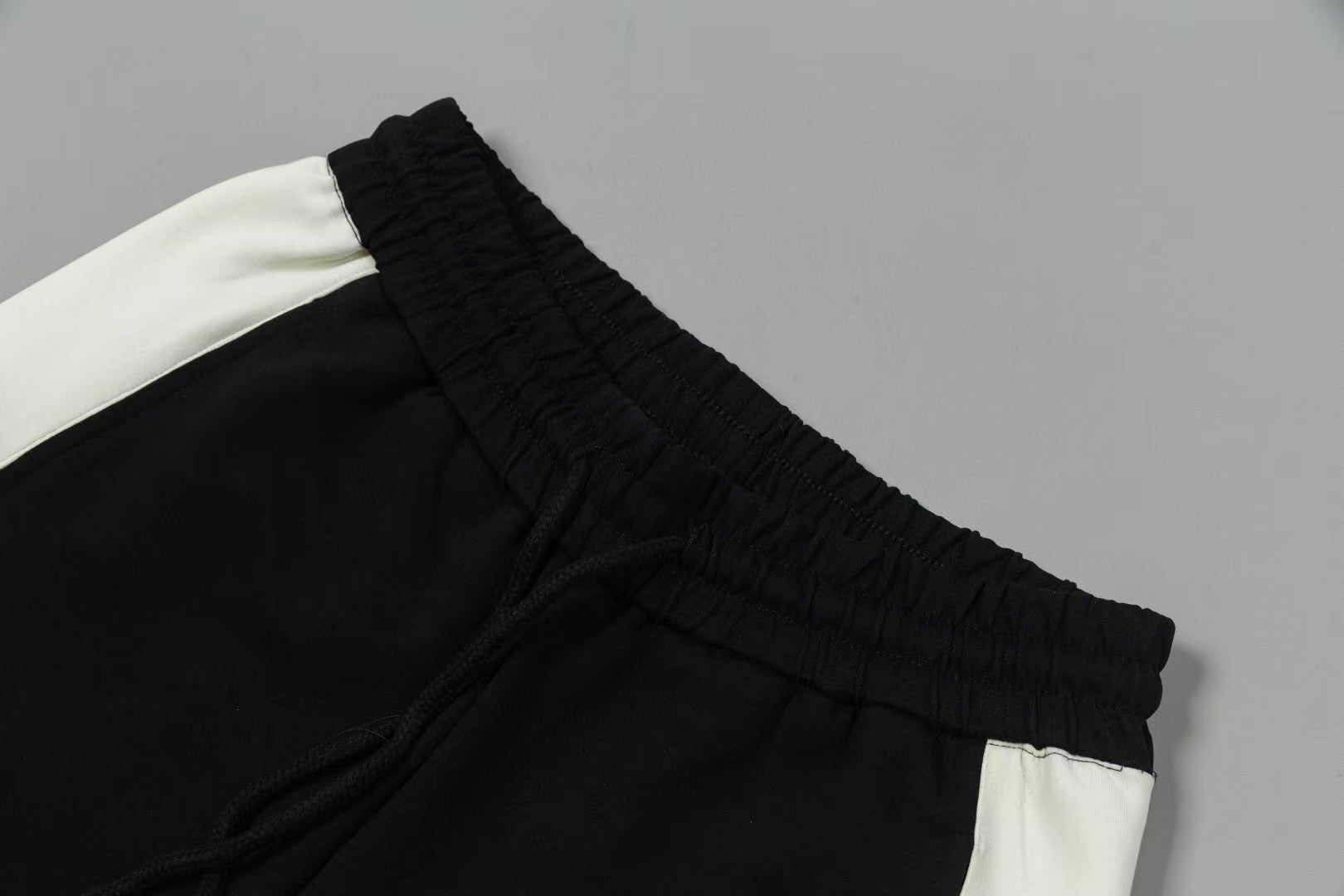 Men's spliced three-dimensional shorts