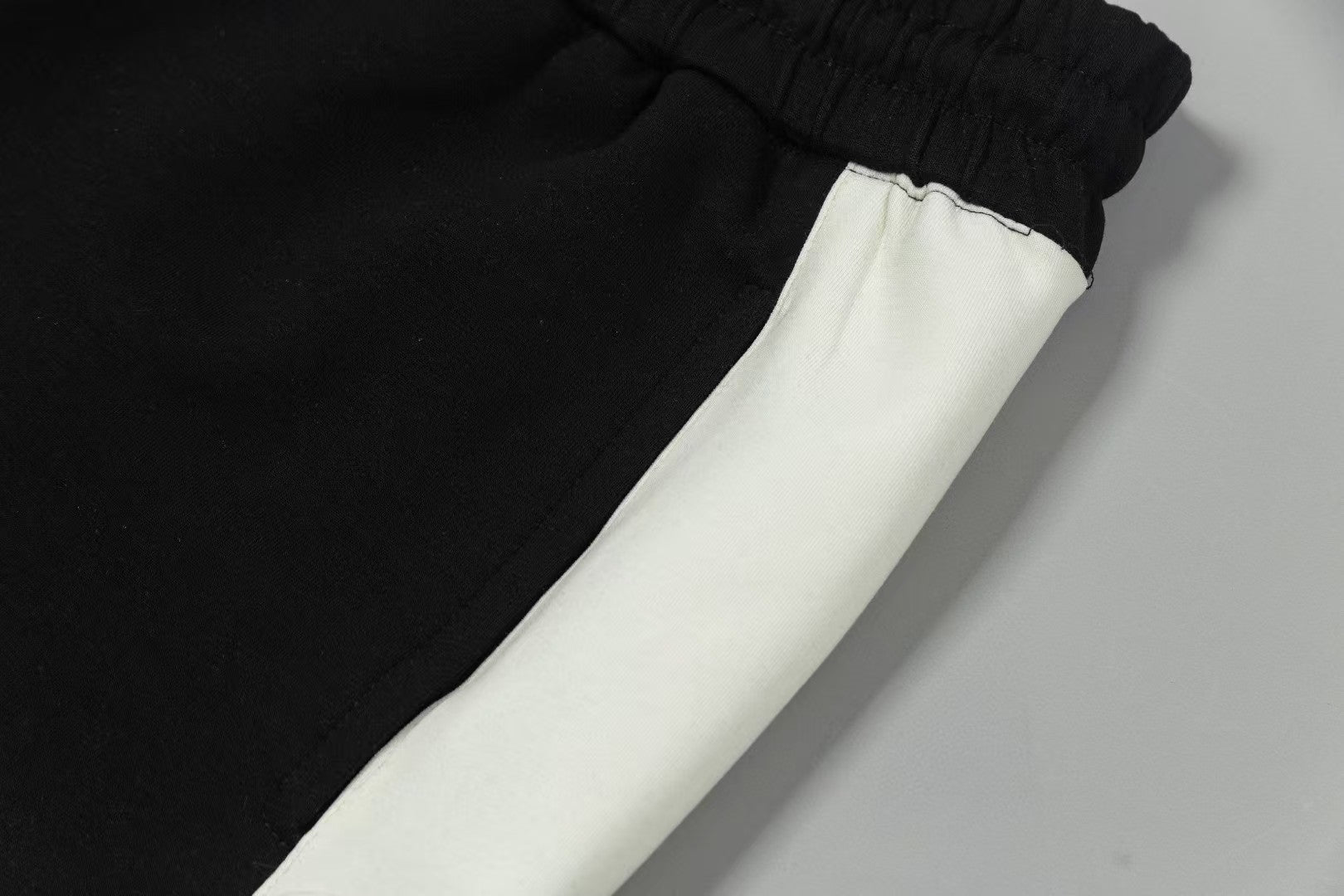Men's spliced three-dimensional shorts