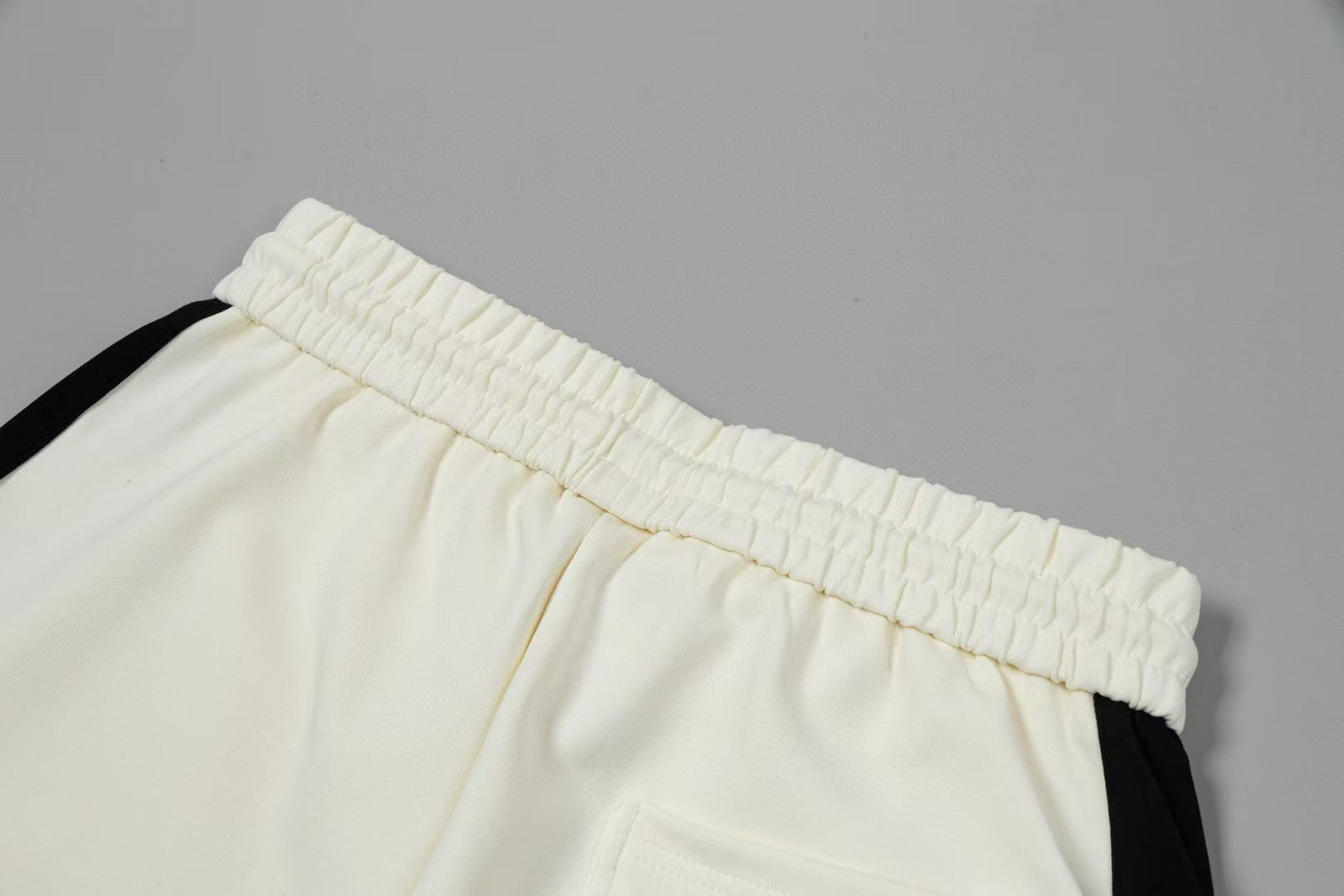 Men's spliced three-dimensional shorts