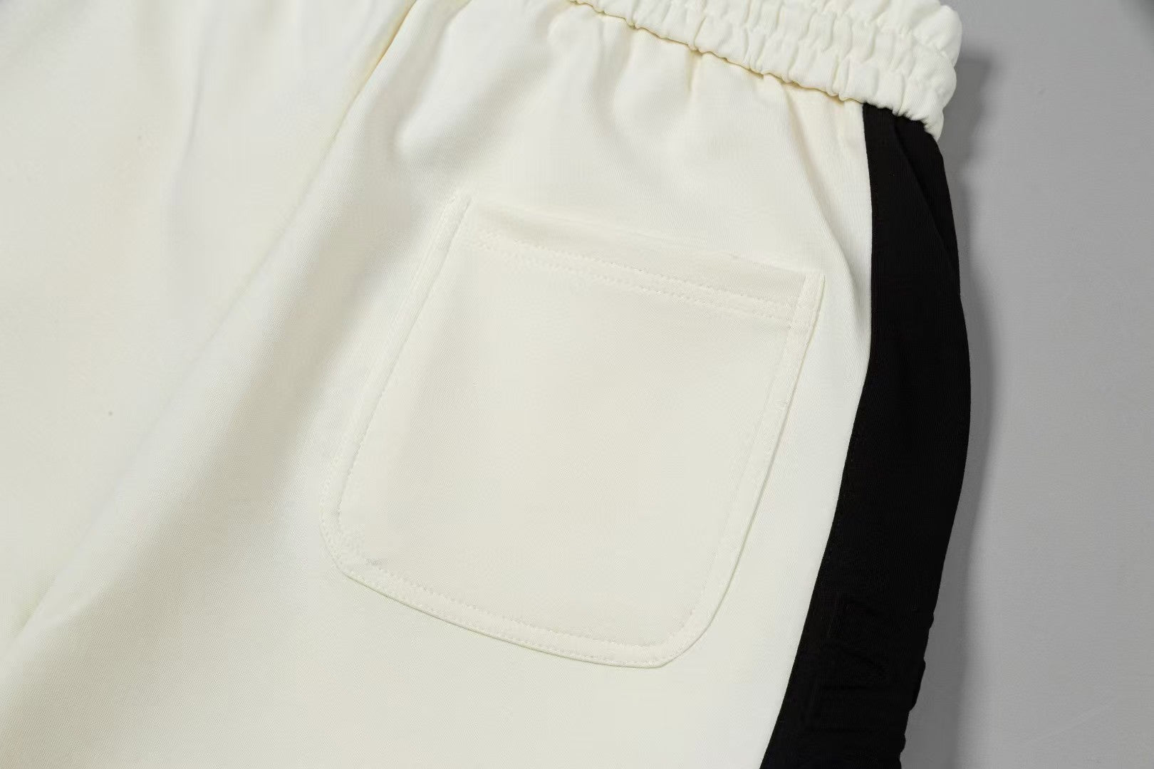 Men's spliced three-dimensional shorts