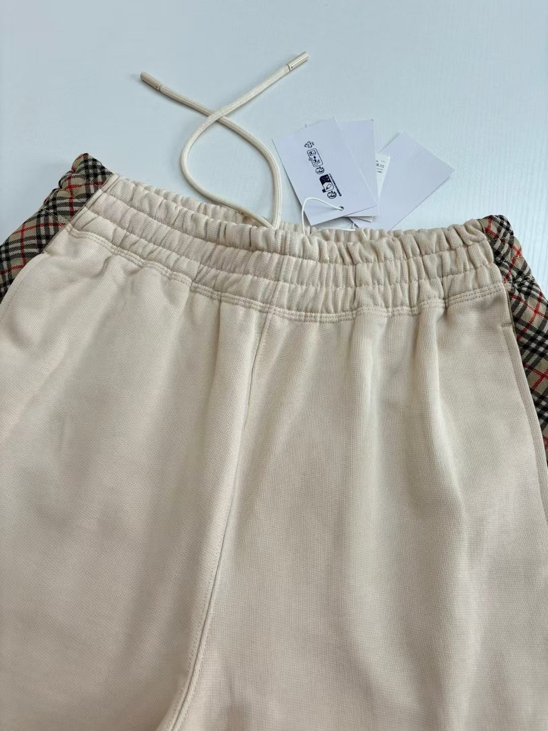 Splicing drawstring shorts