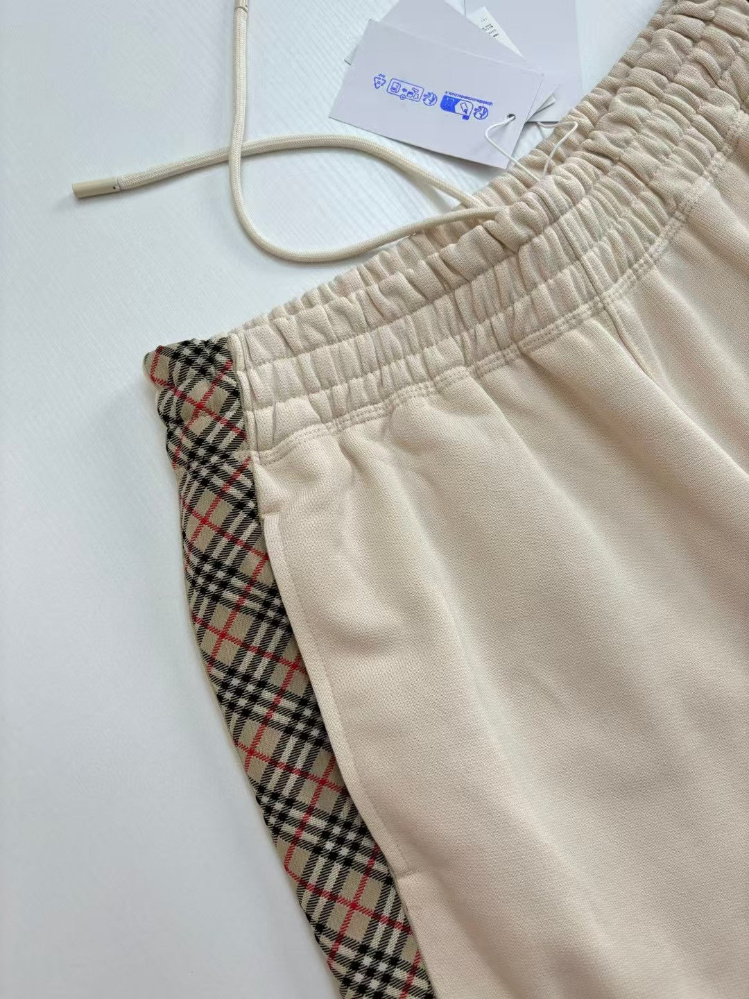 Splicing drawstring shorts