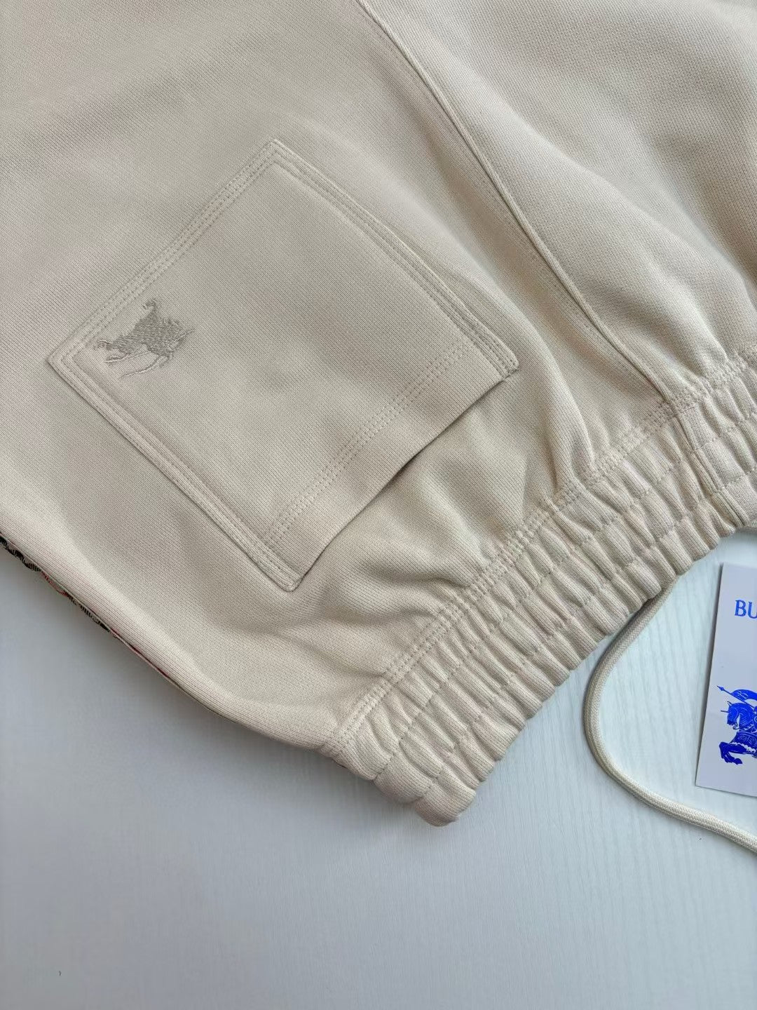 Splicing drawstring shorts