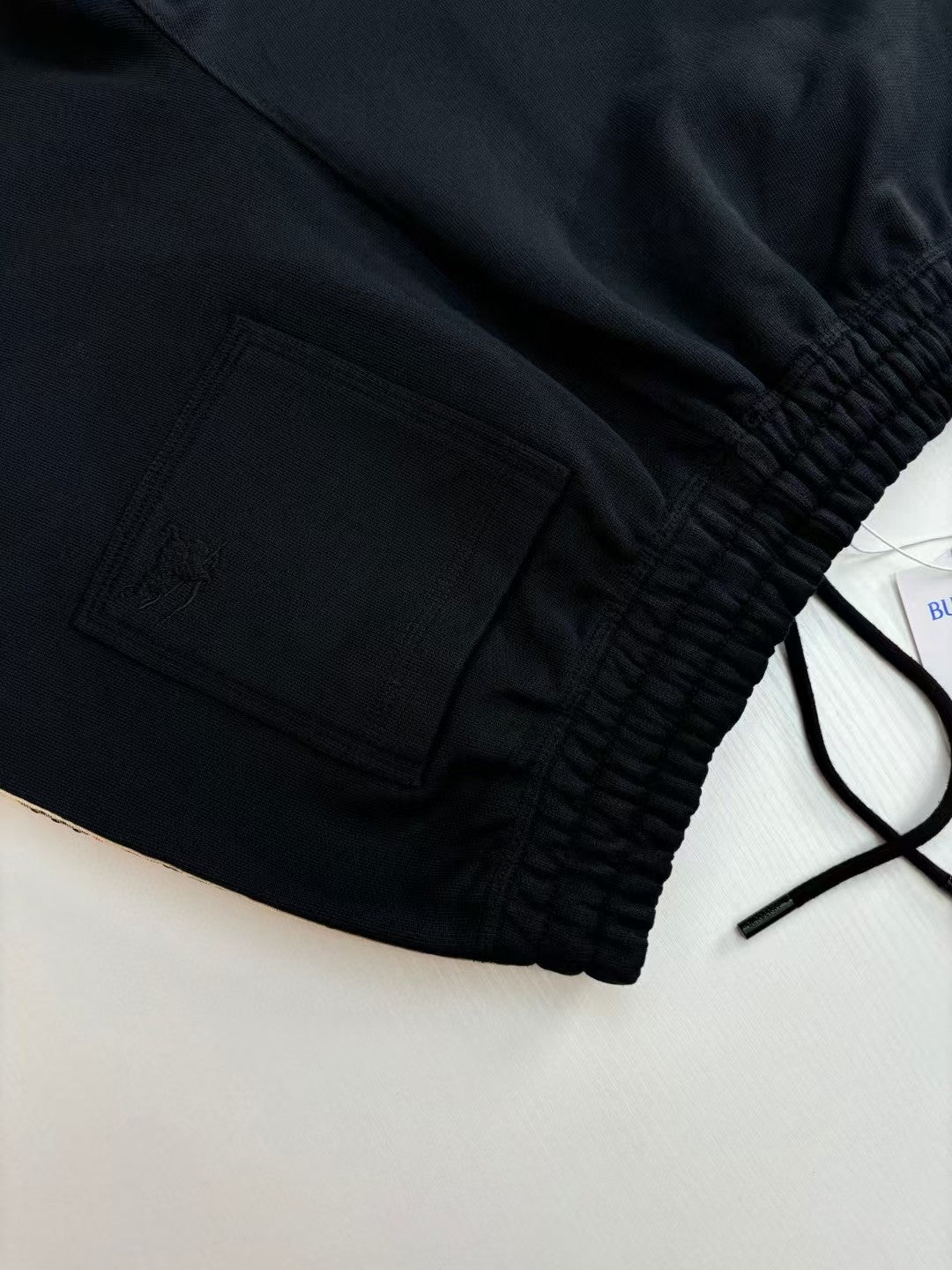 Splicing drawstring shorts