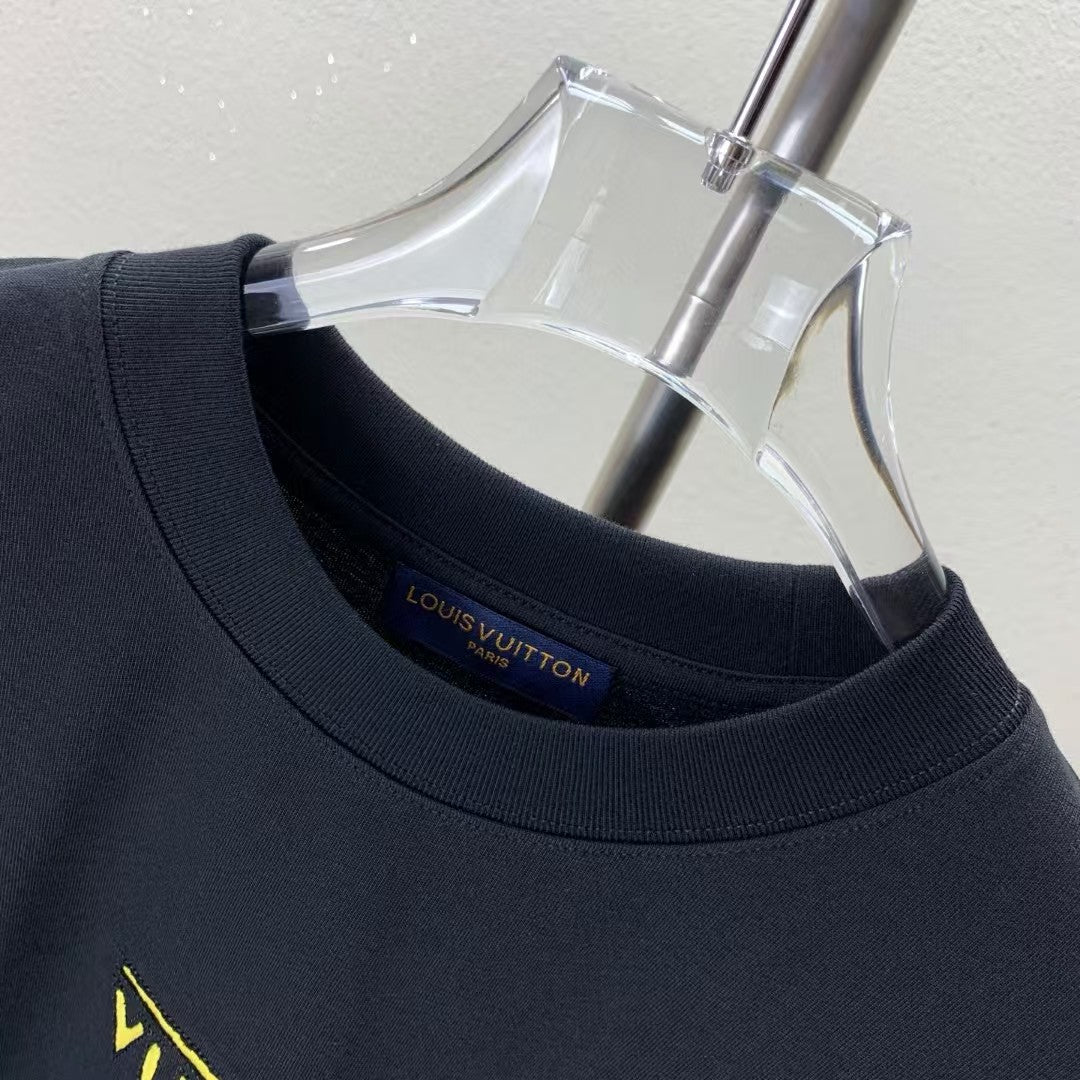 Embroidered round neck T-shirt with adhesive tape