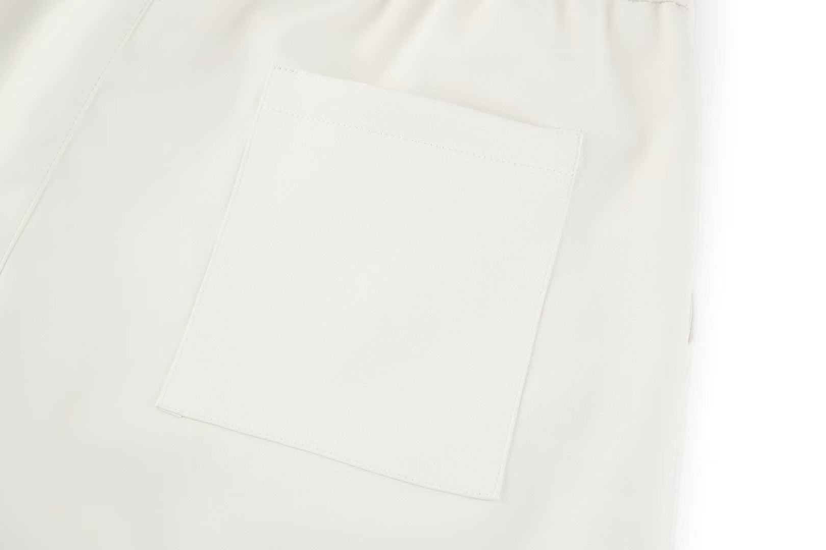 Double sided sheepskin pocket shorts