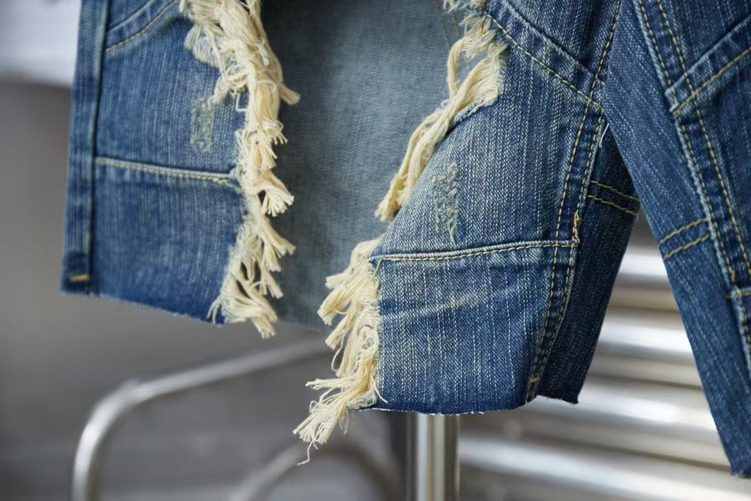 Wear and tear denim shorts with holes