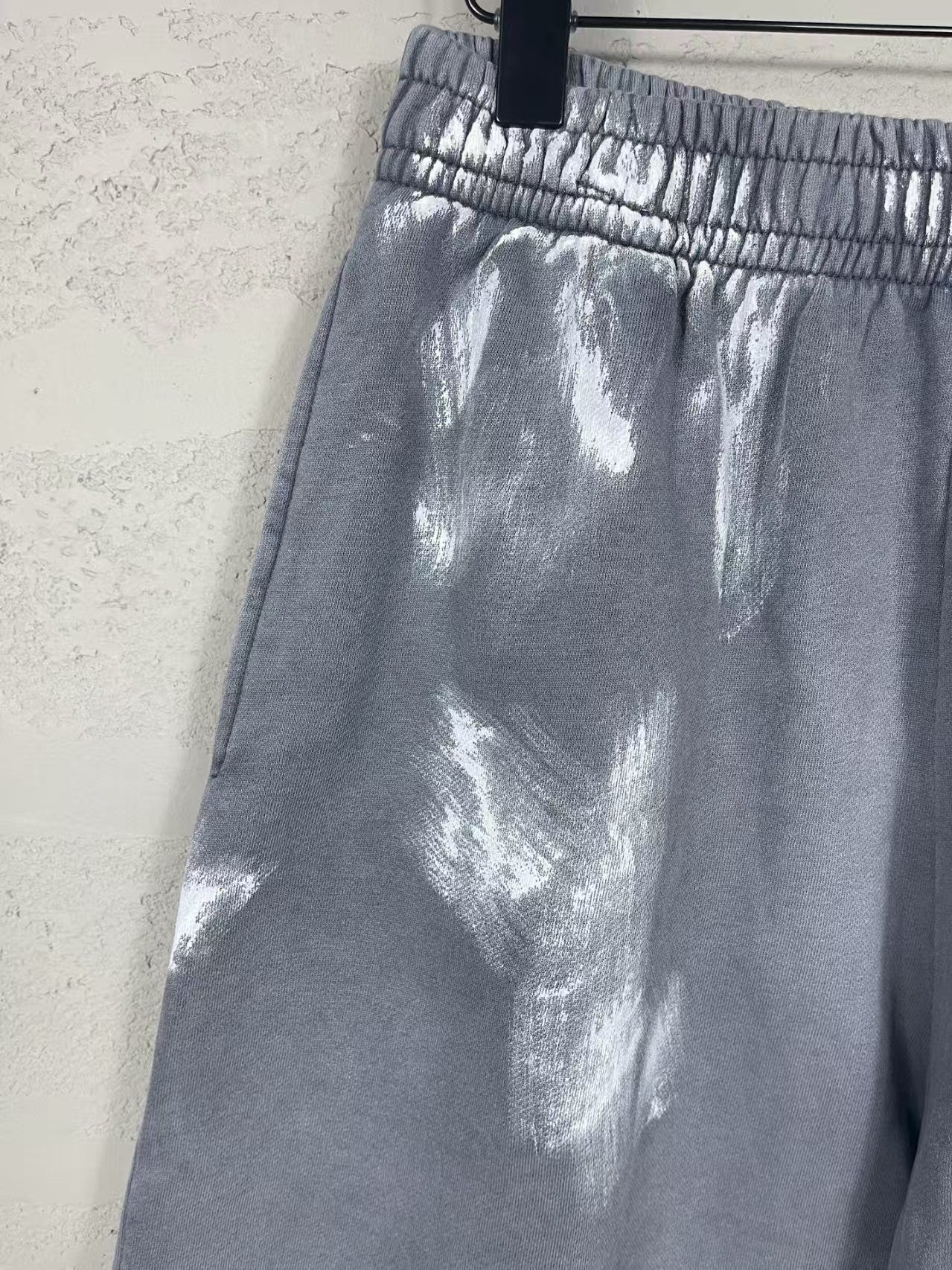 Embroidered, washed, worn, hand drawn graffiti shorts