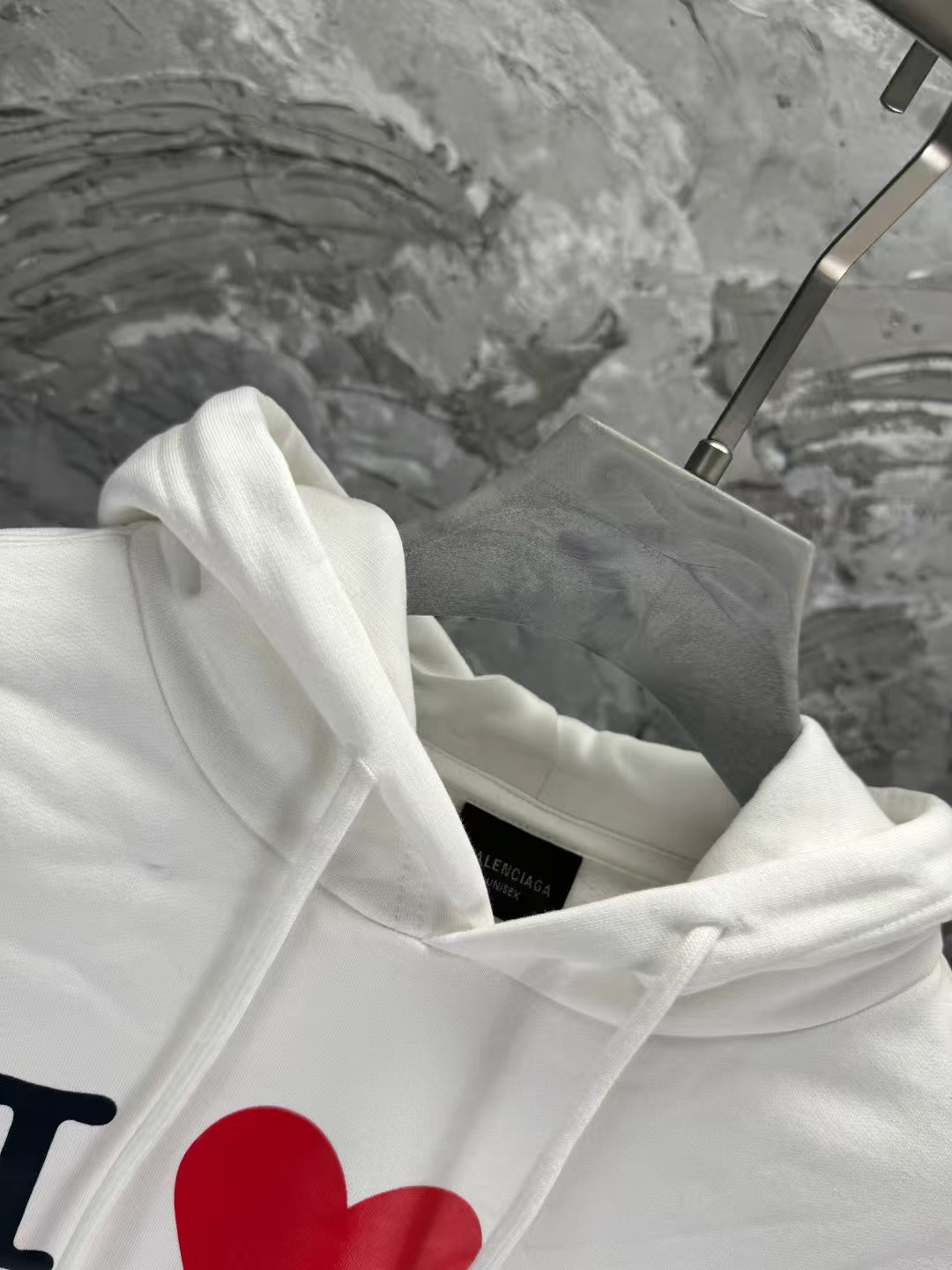 Hooded long sleeved sweatshirt
