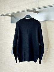 Knitted round neck sweater with armband
