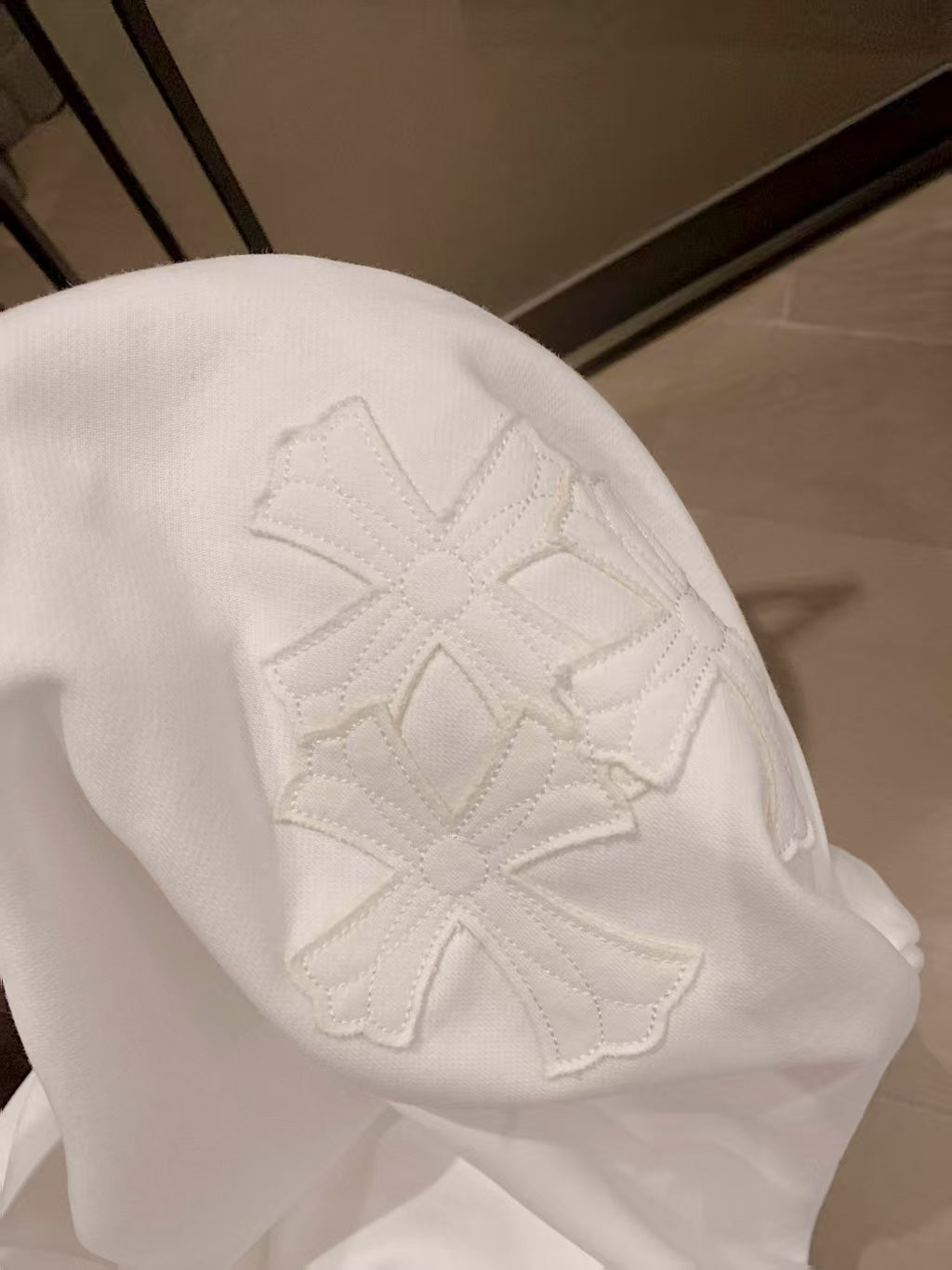 Curved abrasion of thin hoodie