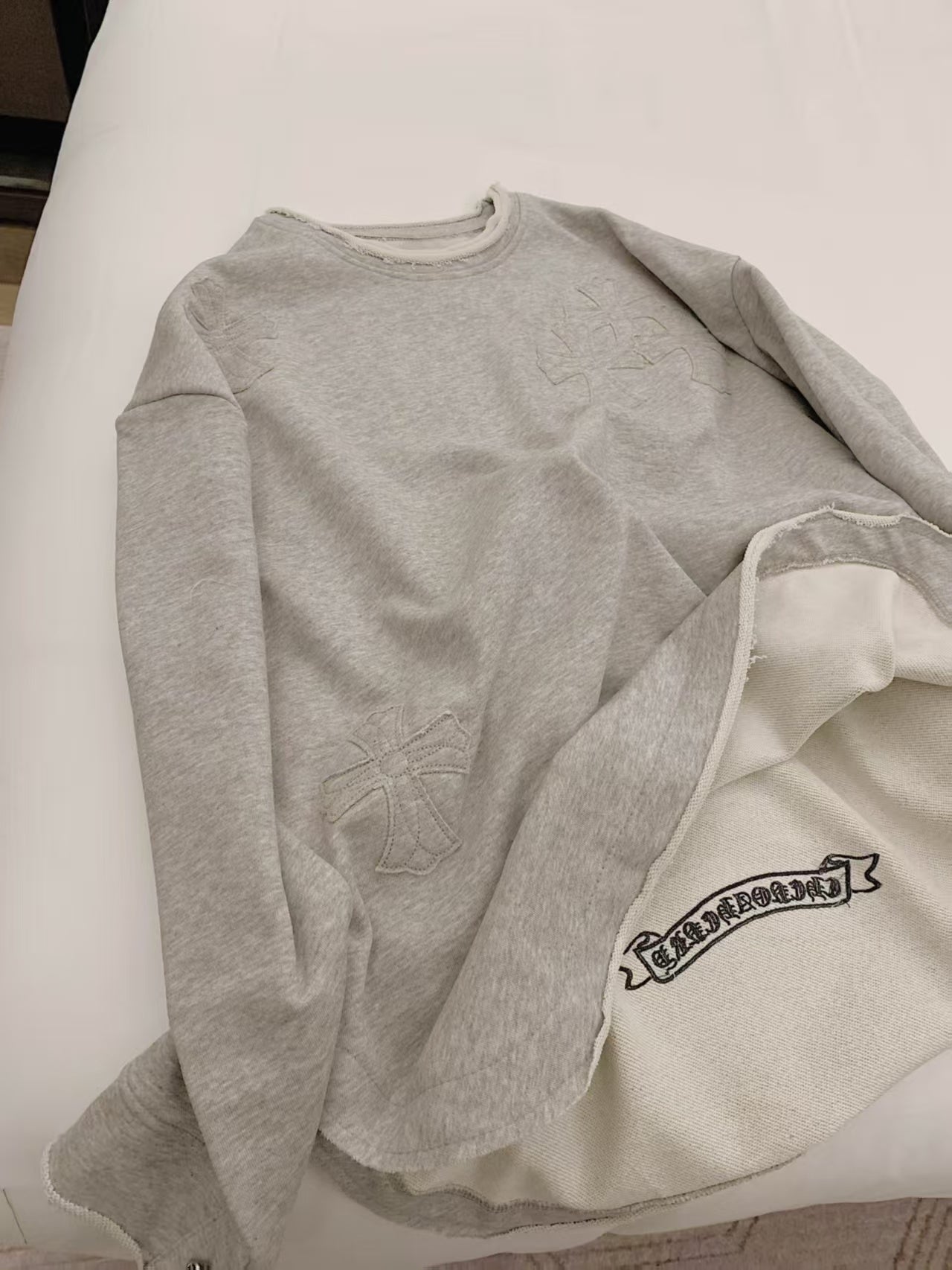 Curved abrasion of thin hoodie
