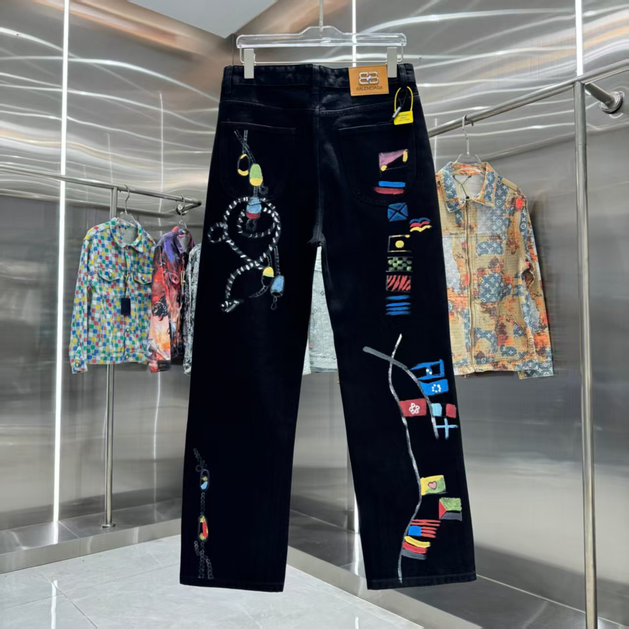 Full of letters spray straight leg jeans