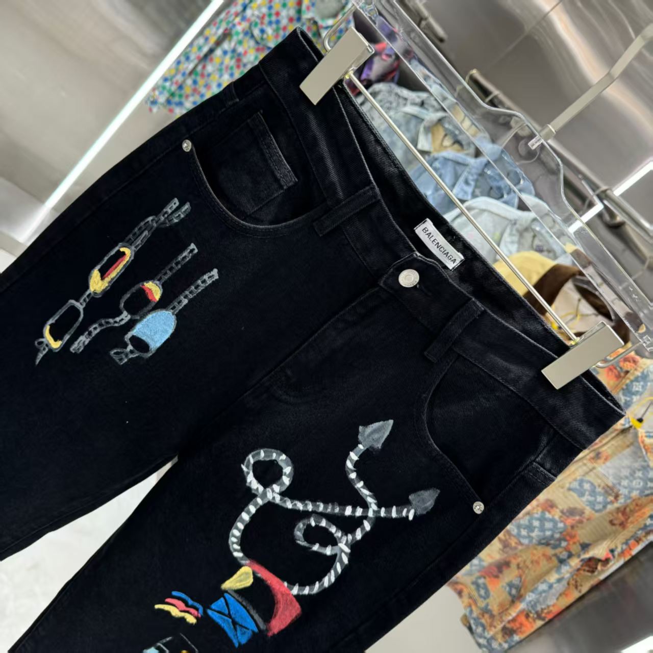 Full of letters spray straight leg jeans
