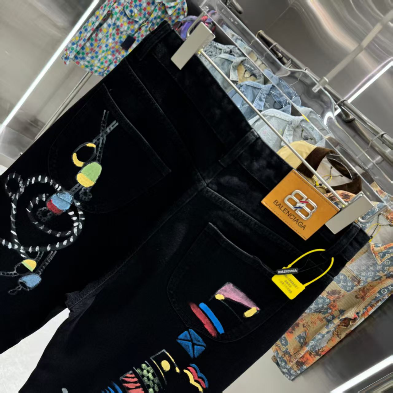Full of letters spray straight leg jeans