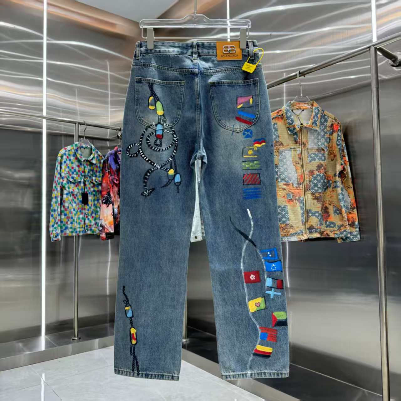 Full of letters spray straight leg jeans