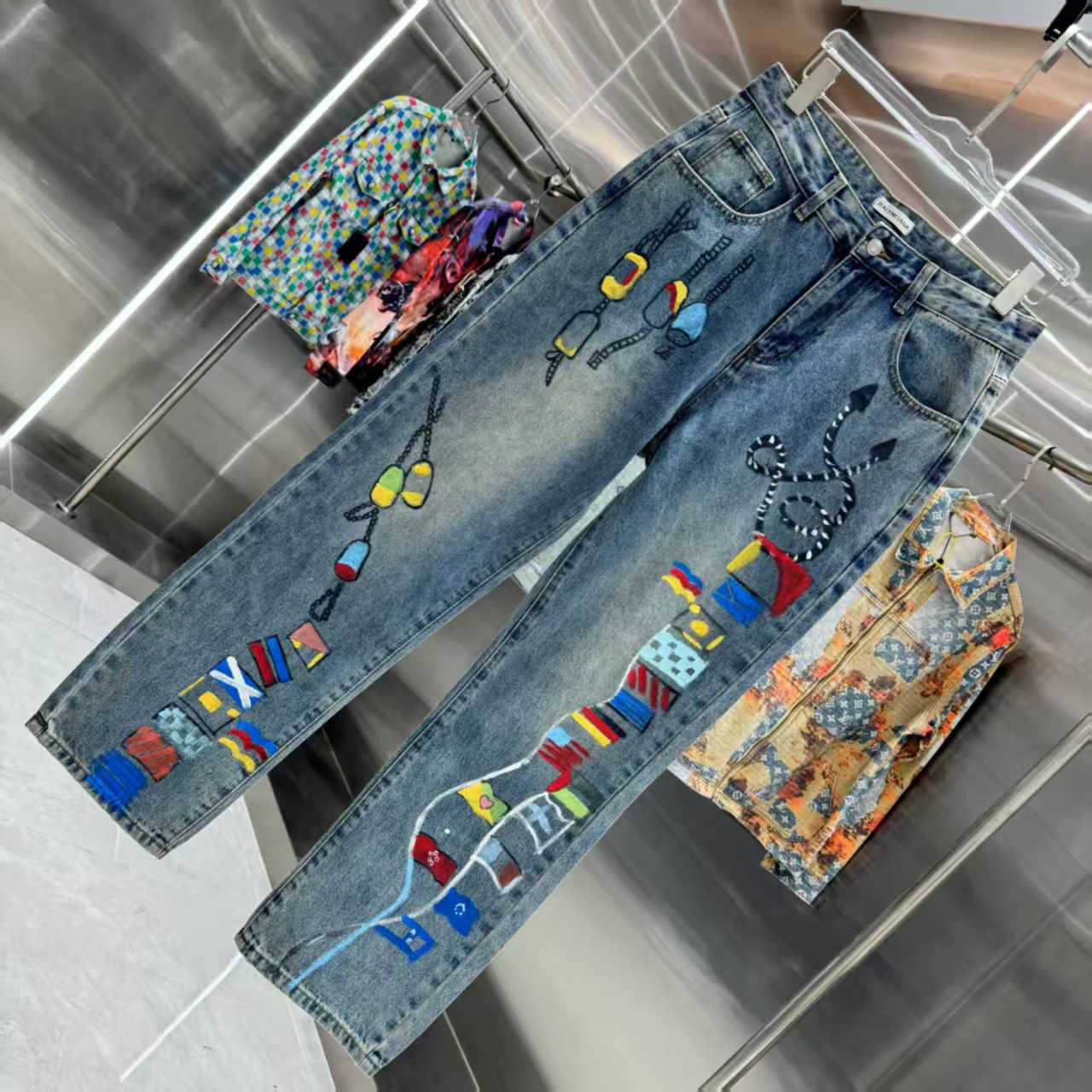 Full of letters spray straight leg jeans