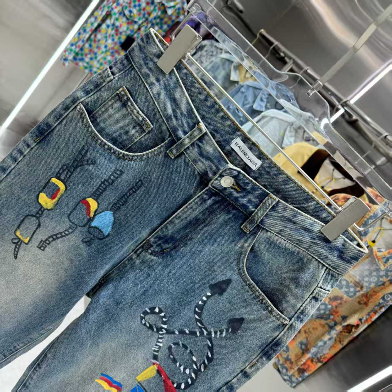 Full of letters spray straight leg jeans