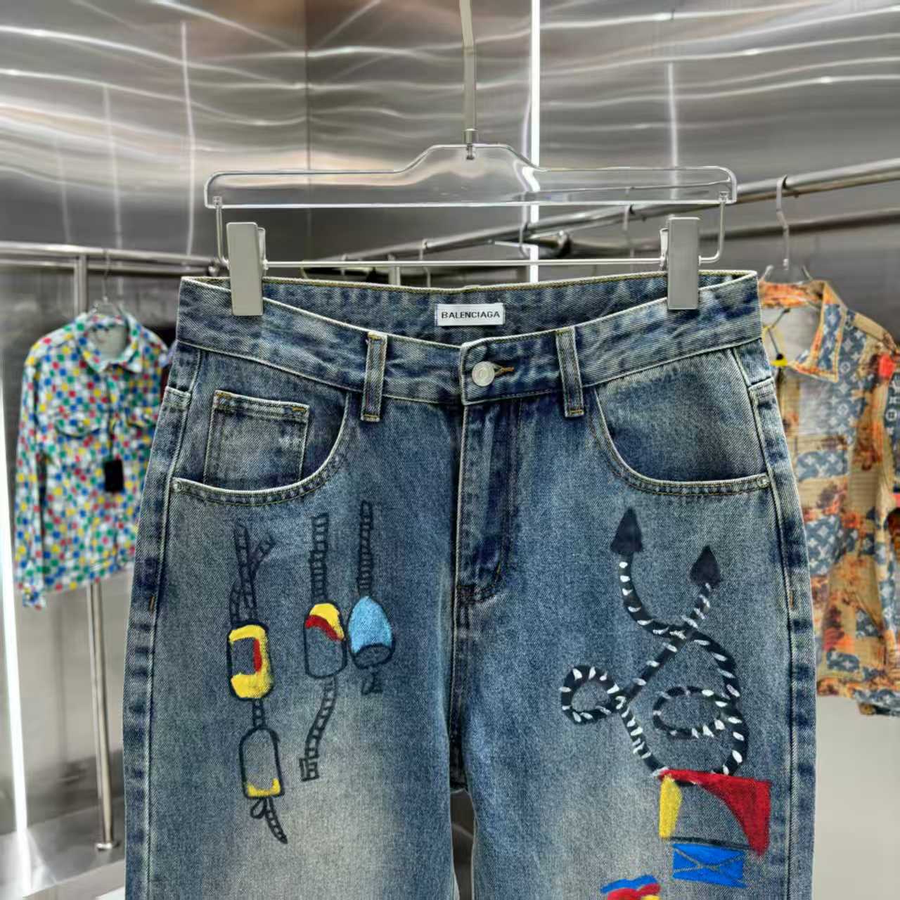 Full of letters spray straight leg jeans