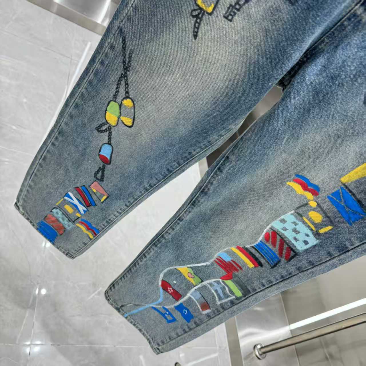 Full of letters spray straight leg jeans