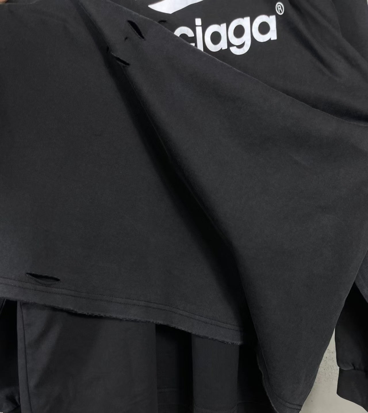 Two piece long sleeved T-shirt with fake sleeves