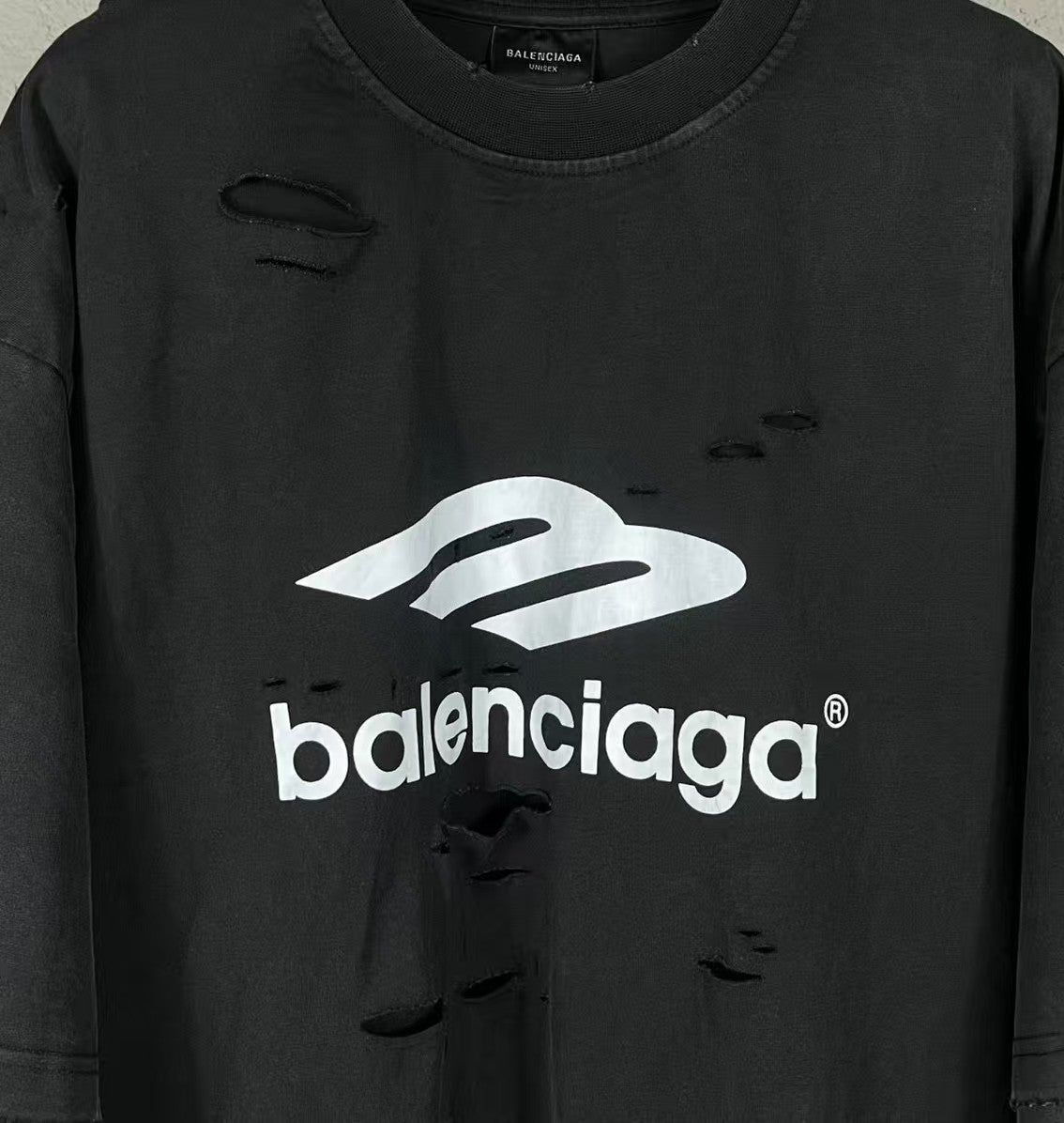 Two piece long sleeved T-shirt with fake sleeves